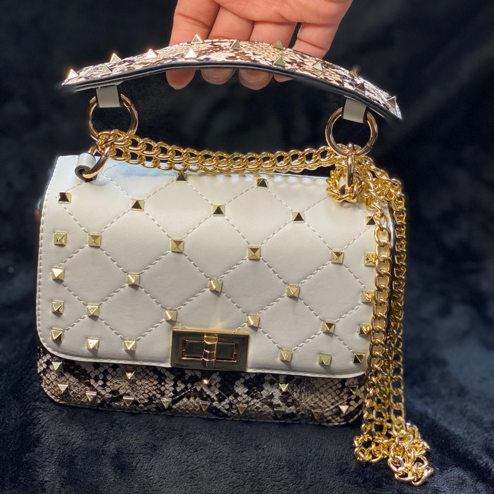 “White Cobra” star studded purse
